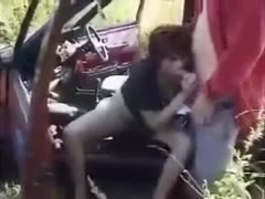 Fucking a lascivious British milf outdoors on the hood of the car 